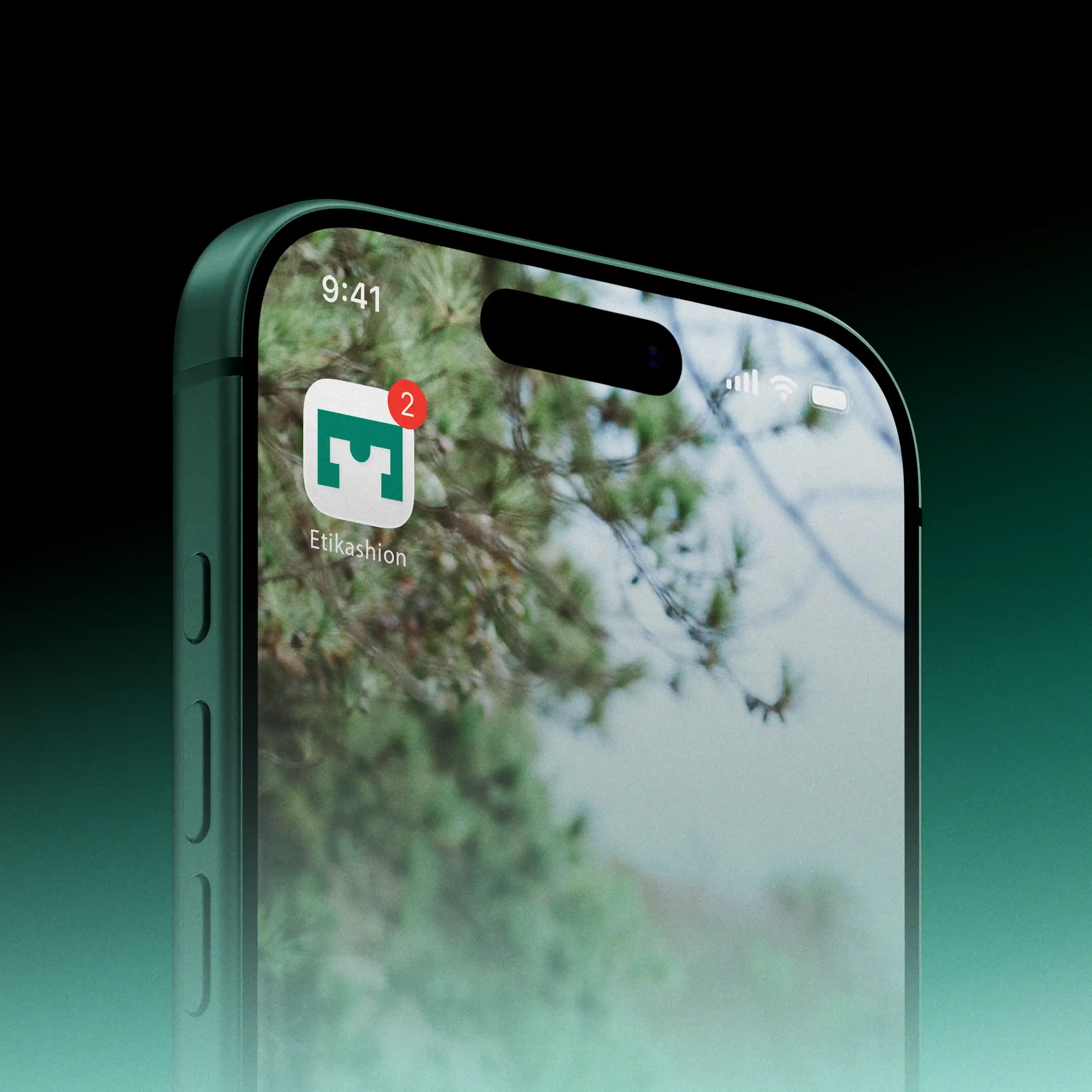 Photo d'un téléphone affichant l'icône de l'application Etikashion.